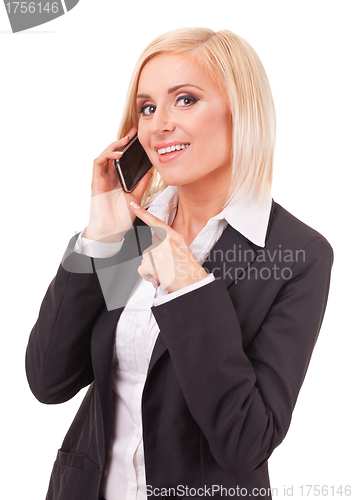 Image of happy female executive speaking on a cellphone