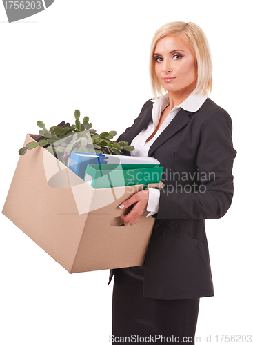 Image of young business woman moving personal things