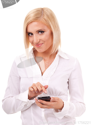 Image of Businesswoman using touch screen smart phone