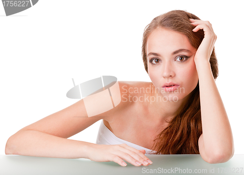 Image of Young woman face on white