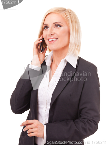 Image of happy female executive speaking on a cellphone