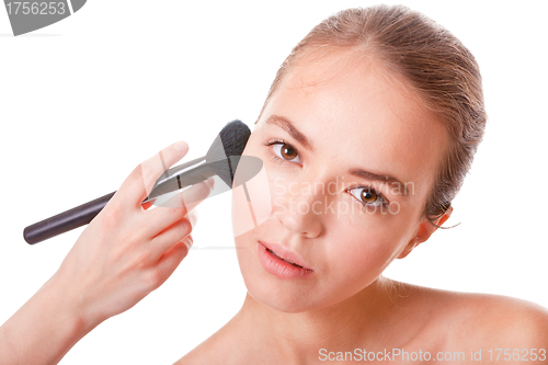 Image of Young woman face on white
