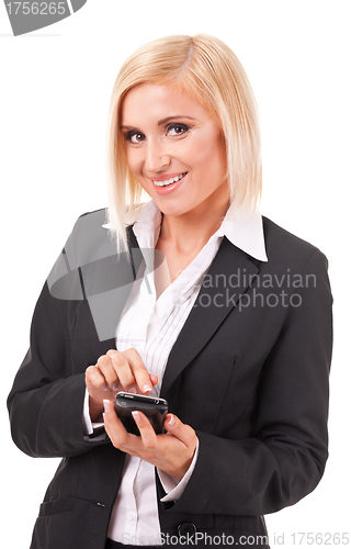 Image of Businesswoman using touch screen smart phone