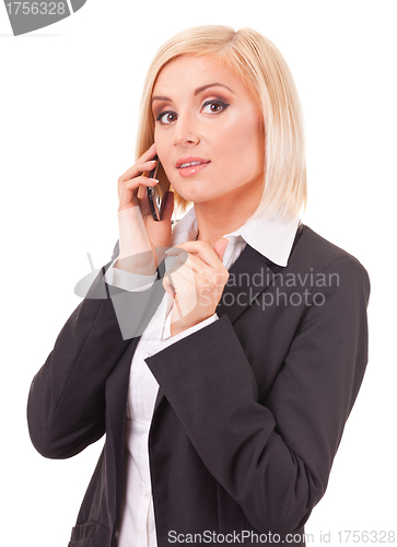 Image of happy female executive speaking on a cellphone