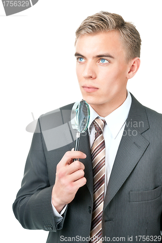 Image of Expert ( inspector ) with a magnifying glass 