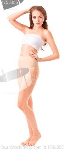 Image of young slim woman posing on white background