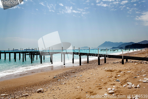 Image of Beach with pier at the mediterranean sea