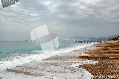 Image of Beach with pier at the mediterranean sea