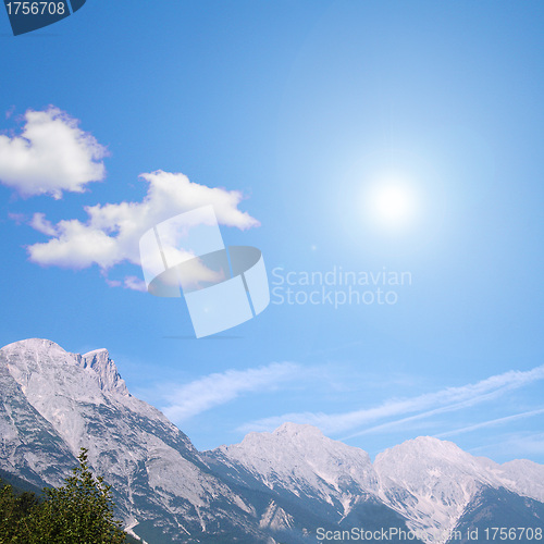 Image of white clouds and blue sky in the mountain country