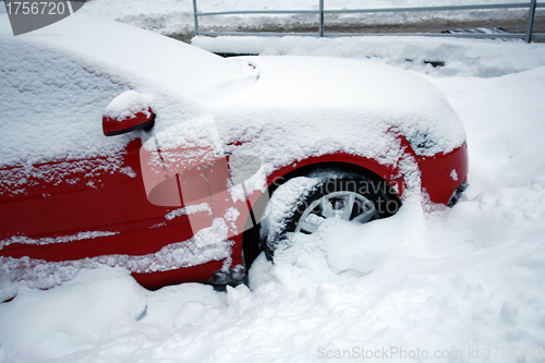 Image of  car covered with snow