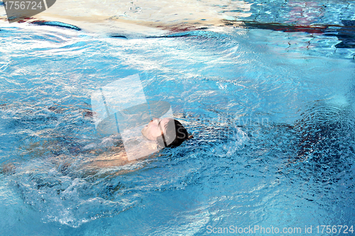 Image of young man learn swimming backstroke
