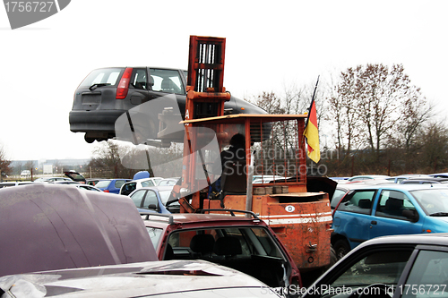 Image of forklift to bring auto scrap