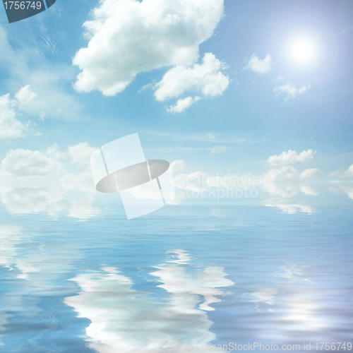Image of sun, blue sky, and ocean of clouds  