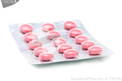 Image of Large pink pills in the package.