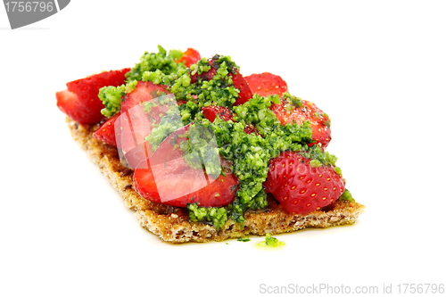 Image of Strawberry on toast with a sauce of almonds, parsley and Parmesa