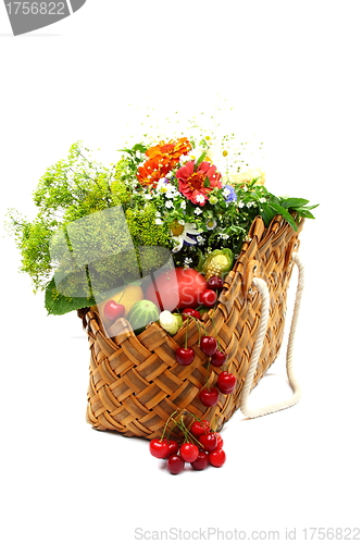Image of Summer fruits, vegetables and flowers in a basket