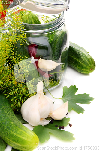 Image of Cucumbers and spices for pickling.