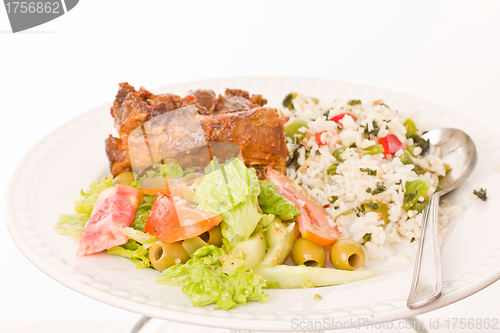 Image of Roast lamb with rice and salad