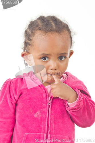 Image of Playful little girl with a finger in her mouth