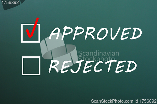 Image of Check boxes for approved and rejected on a green chalkboard 