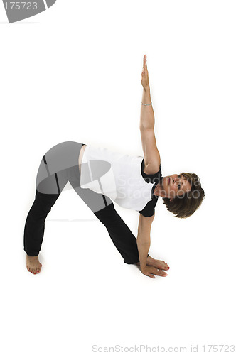 Image of woman doing yoga pose over white BG