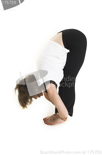 Image of woman in white t-shirt doing yoga