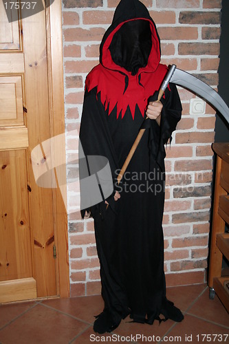 Image of Halloween monster with scythe