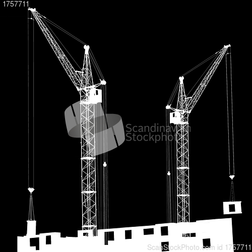 Image of Silhouette of two cranes working on the building 