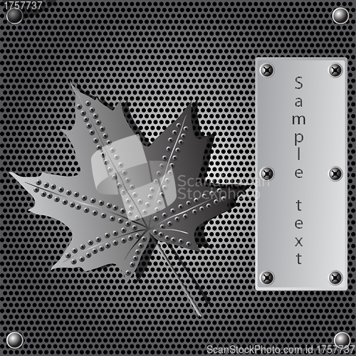 Image of metal shield maple leaf  background with rivets