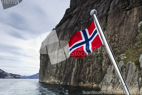 Image of steep mountain over fjord