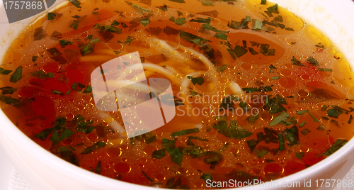 Image of Bowl of Bright Red Creamy Tomato Soup with Yogurt