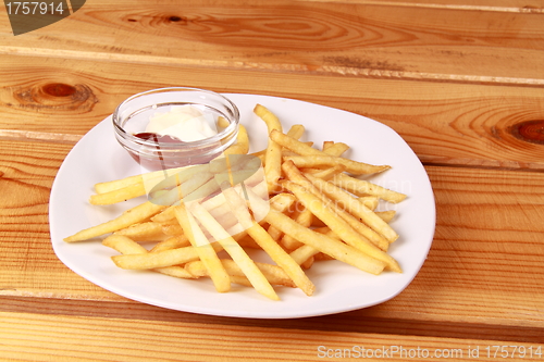 Image of French fries with ketchup