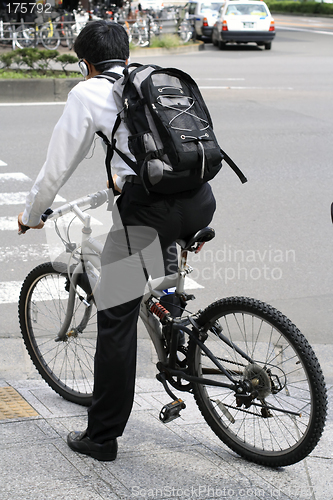 Image of Young man on a bicycle