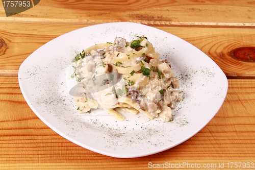 Image of pasta with tomato sauce and meat