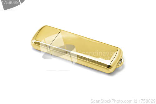 Image of gold USB flash drive on white