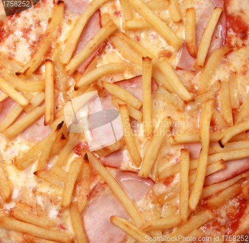 Image of French fries with meat close up