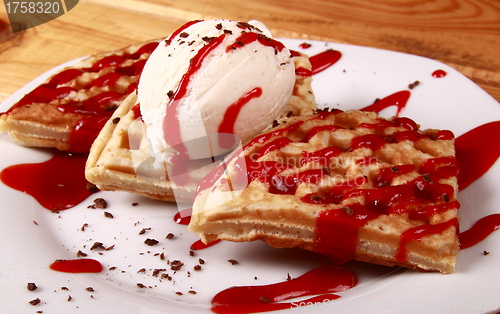 Image of sweet pancakes with creem and ice cream