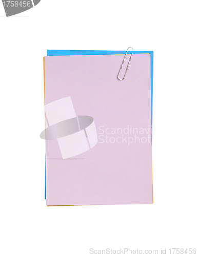 Image of Blank note paper and paper-clip. Isolated