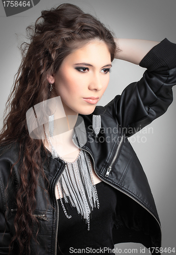 Image of potrait of beutiful girl with glamour necklace and earrings