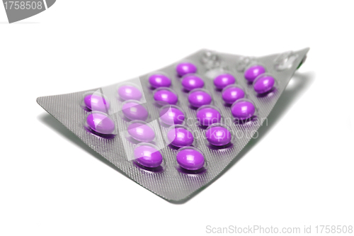 Image of a lot of medical pills on white background