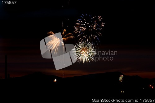 Image of Firecrackers In The Sky During Sunset