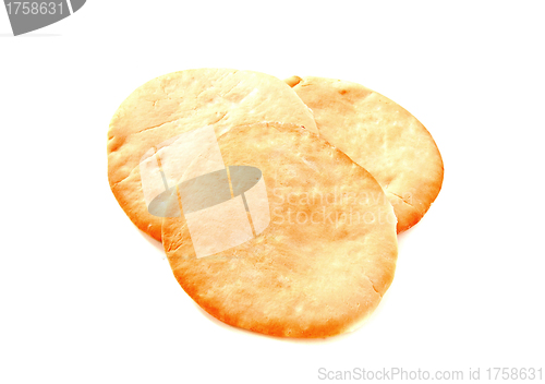 Image of salty  bread over white background