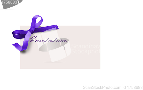 Image of close up of card note with purple ribbon on white