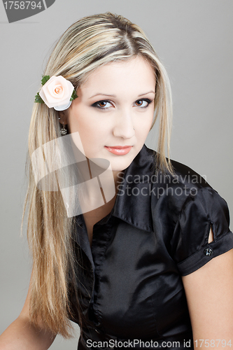 Image of Portrait of young beautiful woman with long blond hair