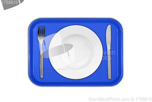 Image of Set of utensils arranged on the table with plate