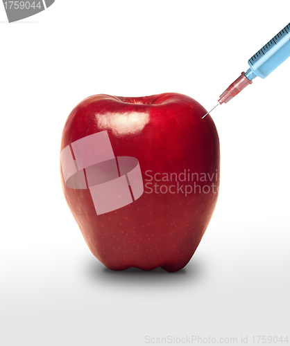 Image of Apple GMO. Apple and syringe