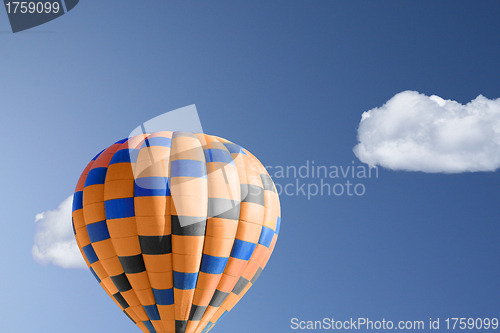 Image of Hot air balloon against brilliant blue sky