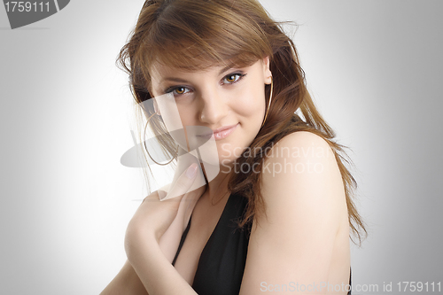 Image of Beautiful sexual girl brown haired pose on gray background