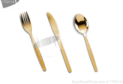 Image of The golden plug and knife isolated on white