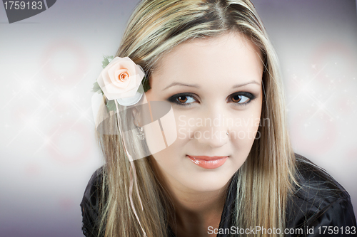 Image of Portrait of young beautiful woman with long blond hair